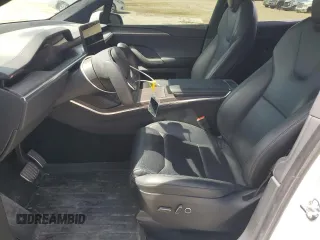 2022 Tesla Model X with VIN 7SAXCBE52NF362994, listed as a Copart auction lot 49850475 with 55,506 mi miles and Salvage Title. Bid and sale history available at DreamBid. Image 7.