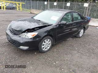 2003 Toyota Camry LE z VIN 4T1BF30KX3U049919, wystawiony jako IAAI lot #42148543 z przebiegiem 208 140 mil mil oraz . Historia ofert i sprzedaży dostępna na DreamBid. Obrazek 10.