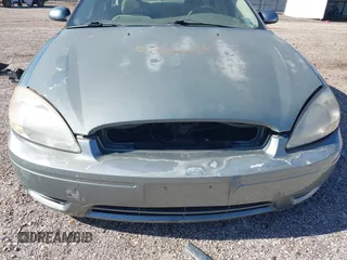 2005 Ford Taurus SEL z VIN 1FAFP56205A232164, wystawiony jako IAAI lot #42201770 z przebiegiem 115 406 mil mil oraz . Historia ofert i sprzedaży dostępna na DreamBid. Obrazek 14.
