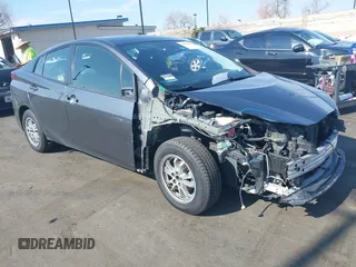 2019 Toyota Prius L Eco z VIN JTDKARFU6K3102490, wystawiony jako IAAI lot #41442665 z przebiegiem 172 034 mil mil oraz . Historia ofert i sprzedaży dostępna na DreamBid. Obrazek 1.