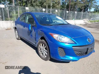 2012 Mazda 3 i Touring with VIN JM1BL1V77C1640555, listed as a IAAI auction lot 42180402 with 87,032 mi miles and . Bid and sale history available at DreamBid. Image 1.