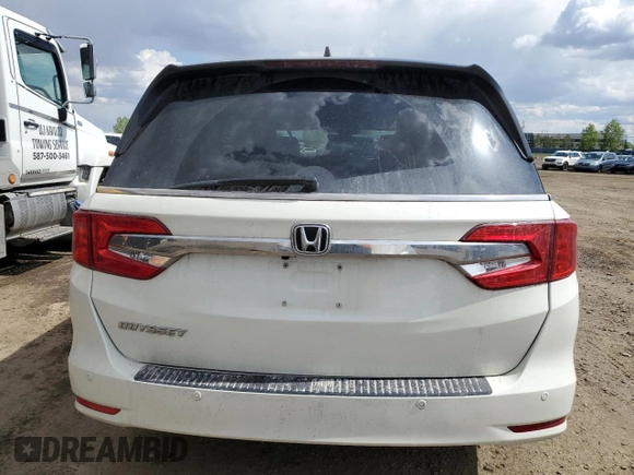 2018 Honda Odyssey EX-L z VIN 5FNRL6H68JB508942, wystawiony jako Copart lot #57323725 z przebiegiem 106 083 mil mil oraz Czysty tytuł • Clean title. Historia ofert i sprzedaży dostępna na DreamBid. Obrazek 6.