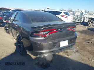 2018 Dodge Charger SXT with VIN 2C3CDXBG6JH126031, listed as a IAAI auction lot 41400041 with 127,906 mi miles and . Bid and sale history available at DreamBid. Image 3.