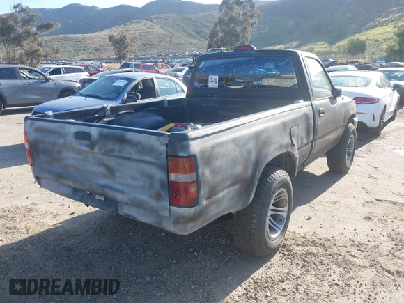 1994 Toyota Pickup z VIN 4TARN81A2RZ306507, wystawiony jako IAAI lot #41834087 z przebiegiem 164 855 mil mil oraz . Historia ofert i sprzedaży dostępna na DreamBid. Obrazek 4.