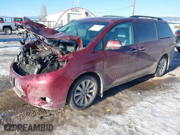 2014 Toyota Sienna XLE with VIN 5TDYK3DC5ES425818, listed as a IAAI auction lot 41421282 with 105,586 mi miles and . Bid and sale history available at DreamBid. Image 2.