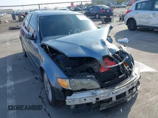 2003 BMW 3 Series 330i with VIN WBAEV53453KM03321, listed as a IAAI auction lot 41134433 with 186,586 mi miles. Bid and sale history available at carsss.com. Image 18.