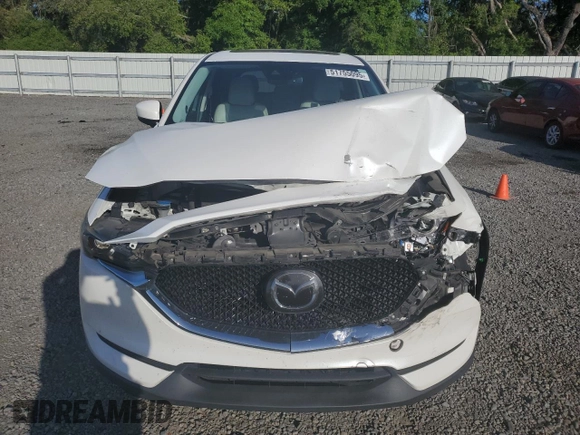 2017 Mazda CX-5 Grand Touring with VIN JM3KFADL1H0141132, listed as a Copart auction lot 51755095 with 116,220 mi miles and Salvage Title. Bid and sale history available at carsss.com. Image 5.
