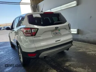 2017 Ford Escape SE z VIN 1FMCU0GD4HUB05330, wystawiony jako IAAI lot #42396863 z przebiegiem 66 420 mil mil oraz . Historia ofert i sprzedaży dostępna na DreamBid. Obrazek 26.