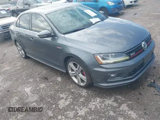 2017 Volkswagen Jetta GLI z VIN 3VW4T7AJ9HM320089, wystawiony jako IAAI lot #42426654 z przebiegiem 129 760 mil mil oraz . Historia ofert i sprzedaży dostępna na DreamBid. Obrazek 1.