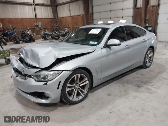 2016 BMW 4 Series 428i xDrive with VIN WBA4C9C5XGG138843, listed as a IAAI auction lot 41747358 with 63,804 mi miles and . Bid and sale history available at DreamBid. Image 17.
