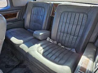 1985 Oldsmobile Toronado Custom Brougham z VIN 1G3EZ57Y7FE330055, wystawiony jako Copart lot #43433285 z przebiegiem 931 486 mil mil oraz Tytuł czysty. Historia ofert i sprzedaży dostępna na DreamBid. Obrazek 6.