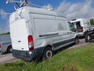 2017 Ford Transit with VIN 1FTYR2XM0HKA58414, listed as a IAAI auction lot 40800755 with 103,205 mi miles and . Bid and sale history available at DreamBid. Image 4.