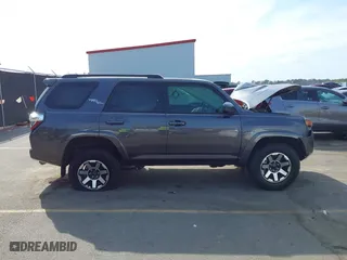 2021 Toyota 4Runner TRD Off Road with VIN JTEPU5JR0M5877962, listed as a IAAI auction lot 41683297 with 61,539 mi miles. Bid and sale history available at carsss.com. Image 13.