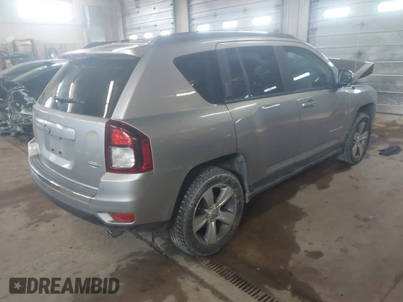 2016 Jeep Compass High Altitude Edition with VIN 1C4NJCEA2GD720148, listed as a IAAI auction lot 41689653 with 97,400 mi miles. Bid and sale history available at carsss.com. Image 4.