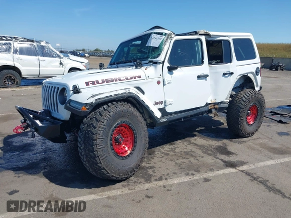 2018 Jeep Wrangler Unlimited Rubicon with VIN 1C4HJXFGXJW110629, listed as a IAAI auction lot 42141572 with 65,973 mi miles and . Bid and sale history available at DreamBid. Image 2.