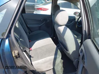 2003 Ford Focus SE with VIN 1FAFP34P23W313184, listed as a IAAI auction lot 42684410 with 77,248 mi miles and . Bid and sale history available at DreamBid. Image 8.