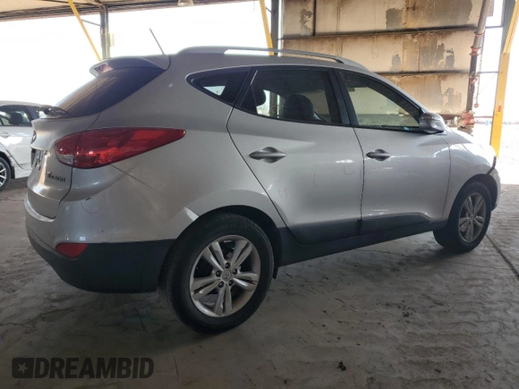 2013 Hyundai Tucson GLS with VIN KM8JU3AC9DU656873, listed as a Copart auction lot 43783415 with 143,513 mi miles and Salvage Title. Bid and sale history available at carsss.com. Image 3.