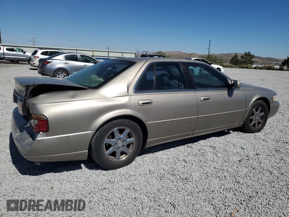 2000 Cadillac Seville Touring STS z VIN 1G6KY5498YU255607, wystawiony jako Copart lot #71130714 z przebiegiem 146 046 mil mil oraz Szkoda całkowita • Salvage title. Historia ofert i sprzedaży dostępna na DreamBid. Obrazek 3.