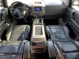 2004 Nissan Titan LE with VIN 1N6AA07A44N580326, listed as a Copart auction lot 53446825 with 236,618 mi miles and Salvage title. Bid and sale history available at DreamBid. Image 8.