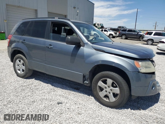 2006 Suzuki Grand Vitara Premium with VIN JS3TD943964102832, listed as a Copart auction lot 59971694 with 148,329 mi miles and Salvage title. Bid and sale history available at DreamBid. Image 4.
