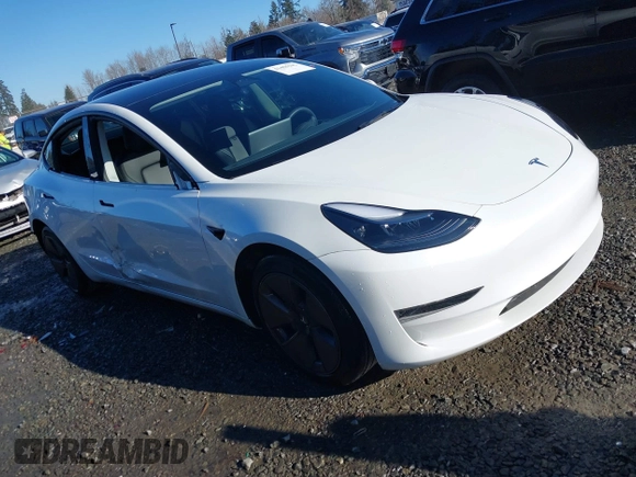 2023 Tesla Model 3 z VIN 5YJ3E1EA0PF611244, wystawiony jako IAAI lot #41455102 z przebiegiem 21 867 mil mil oraz . Historia ofert i sprzedaży dostępna na DreamBid. Obrazek 1.