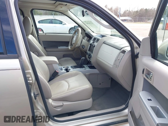 2010 Mercury Mariner Premier with VIN 4M2CN8HG4AKJ05736, listed as a IAAI auction lot 41744987 with 209,819 mi miles and . Bid and sale history available at DreamBid. Image 5.