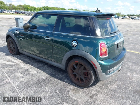 2007 MINI Hardtop S with VIN WMWMF73507TV30183, listed as a IAAI auction lot 42574374 with 90,334 mi miles and . Bid and sale history available at DreamBid. Image 3.