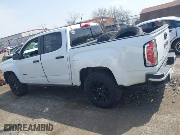 2021 GMC Canyon 4WD AT4 z VIN 1GTG6FENXM1291689, wystawiony jako IAAI lot #42038884 z przebiegiem 54 884 mil mil oraz . Historia ofert i sprzedaży dostępna na DreamBid. Obrazek 14.