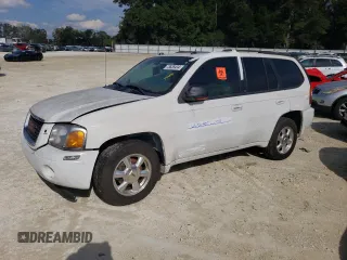 2005 GMC Envoy SLT with VIN 1GKDT13S052311455, listed as a Copart auction lot 73635434 with Not Provided miles and Salvage Title. Bid and sale history available at DreamBid. Image 1.