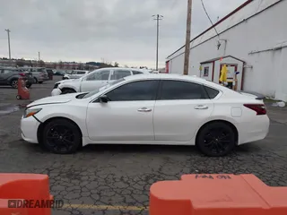 2018 Nissan Altima 2.5 SV with VIN 1N4AL3AP4JC158095, listed as a IAAI auction lot 41155838 with 79,504 mi miles. Bid and sale history available at carsss.com. Image 14.