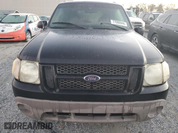 2002 Ford Explorer Sport Value z VIN 1FMYU60E92UC86847, wystawiony jako Copart lot #77086944 z przebiegiem 147 827 mil mil oraz Szkoda całkowita • Salvage title. Historia ofert i sprzedaży dostępna na DreamBid. Obrazek 5.