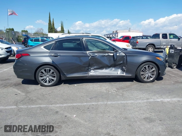 2018 Genesis G80 3.8L z VIN KMHGN4JEXJU283935, wystawiony jako IAAI lot #41750441 z przebiegiem 70 165 mil mil oraz . Historia ofert i sprzedaży dostępna na DreamBid. Obrazek 13.
