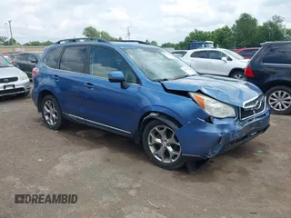 2015 Subaru Forester Touring with VIN JF2SJAUC9FH428273, listed as a IAAI auction lot 42580370 with 140,732 mi miles and . Bid and sale history available at DreamBid. Image 1.
