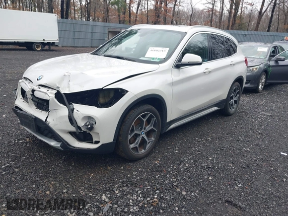 2018 BMW X1 xDrive28i with VIN WBXHT3C36J5L32162, listed as a IAAI auction lot 41802315 with 80,422 mi miles. Bid and sale history available at carsss.com. Image 2.