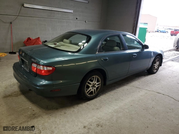 2000 Mazda Millenia with VIN JM1TA2212Y1610919, listed as a Copart auction lot 80375014 with NaN miles and Salvage Title. Bid and sale history available at carsss.com. Image 3.