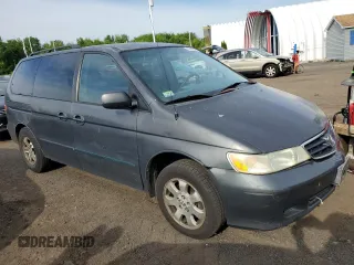 2004 Honda Odyssey EX-RES z VIN 5FNRL188X4B115002, wystawiony jako Copart lot #57883945 z przebiegiem Nie podano mil oraz Szkoda całkowita • Salvage title. Historia ofert i sprzedaży dostępna na DreamBid. Obrazek 4.