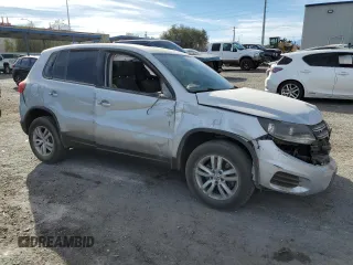 2013 Volkswagen Tiguan S with VIN WVGAV3AX8DW559779, listed as a Copart auction lot 87512845 with 79,169 mi miles and Salvage title. Bid and sale history available at DreamBid. Image 4.