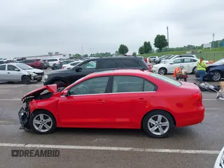 2014 Volkswagen Jetta TDI w/Premium/Nav with VIN 3VWLL7AJ4EM383351, listed as a IAAI auction lot 42424074 with 66,824 mi miles and . Bid and sale history available at DreamBid. Image 15.