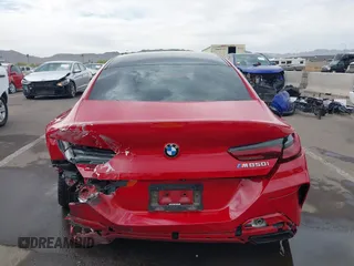 2022 BMW 8 Series M850i z VIN WBAGV8C04NCH90015, wystawiony jako IAAI lot #42020711 z przebiegiem 39 801 mil mil oraz . Historia ofert i sprzedaży dostępna na DreamBid. Obrazek 16.