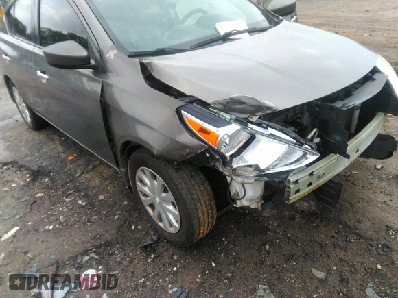 2015 Nissan Versa SV with VIN 3N1CN7AP7FL869485, listed as a IAAI auction lot 42077524 with 198,646 mi miles. Bid and sale history available at carsss.com. Image 6.