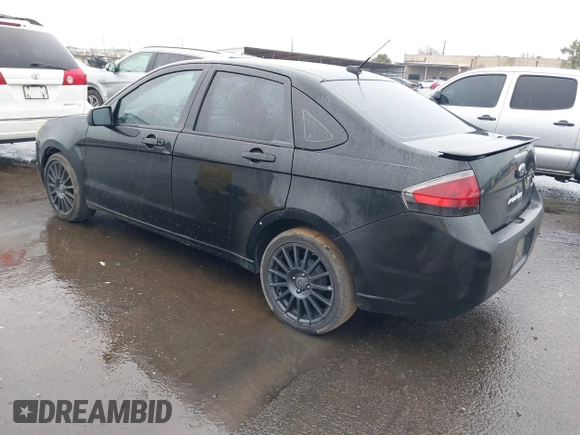 2011 Ford Focus SES with VIN 1FAHP3GN4BW107558, listed as a IAAI auction lot 41507104 with 223,499 mi miles. Bid and sale history available at carsss.com. Image 3.