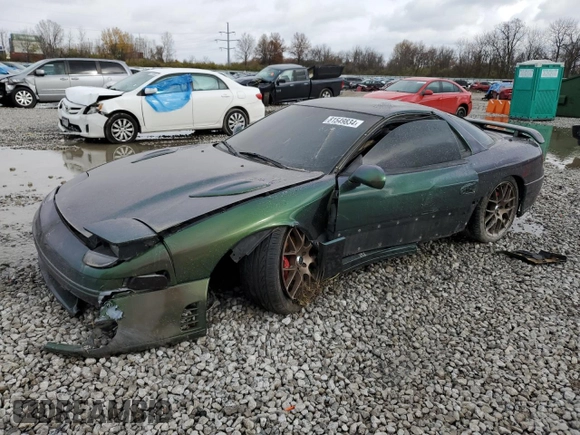 1992 Mitsubishi 3000GT z VIN JA3XE74C2NY028905, wystawiony jako Copart lot #81549834 z przebiegiem 131 349 mil mil oraz Szkoda całkowita • Salvage title. Historia ofert i sprzedaży dostępna na DreamBid. Obrazek 1.