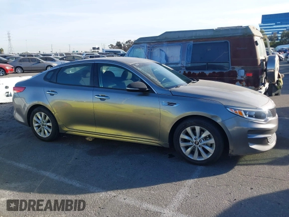 2018 Kia Optima LX with VIN 5XXGT4L32JG256921, listed as a IAAI auction lot 41389850 with 91,013 mi miles and . Bid and sale history available at DreamBid. Image 12.