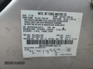 2019 Ford EcoSport SE z VIN MAJ3S2GE6KC263752, wystawiony jako Copart lot #54640544 z przebiegiem 58 629 mil mil oraz Szkody całkowita. Historia ofert i sprzedaży dostępna na DreamBid. Obrazek 13.