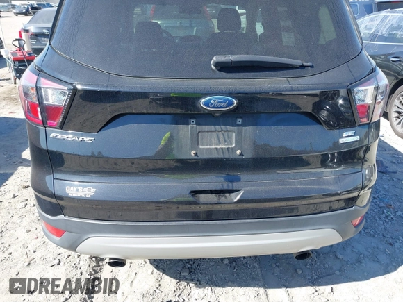 2017 Ford Escape SE with VIN 1FMCU0GD6HUE12367, listed as a IAAI auction lot 41899960 with 121,871 mi miles and . Bid and sale history available at DreamBid. Image 16.
