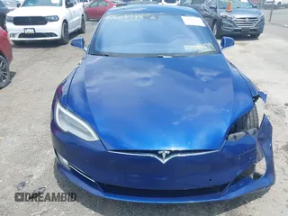 2016 Tesla Model S 70 with VIN 5YJSA1E17GF149479, listed as a IAAI auction lot 42609734 with 175,007 mi miles and . Bid and sale history available at DreamBid. Image 10.