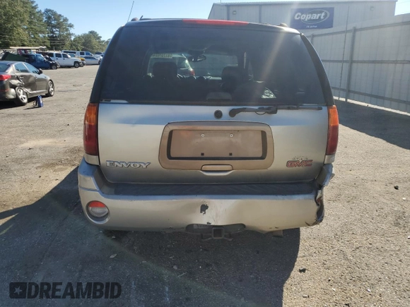 2002 GMC Envoy SLT with VIN 1GKDS13SX22301062, listed as a Copart auction lot 81791024 with 0 mi miles and Salvage Title. Bid and sale history available at carsss.com. Image 6.