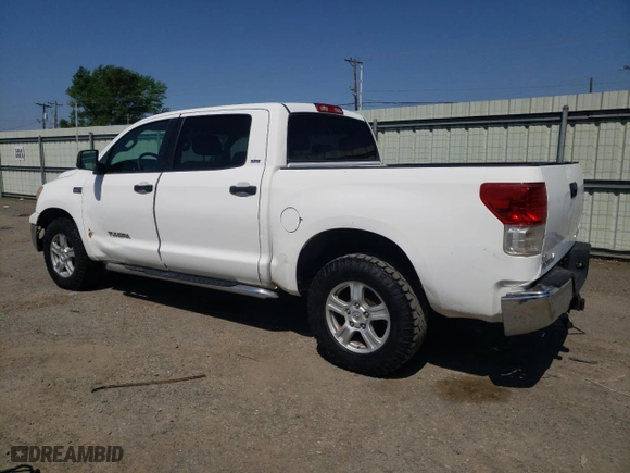 2011 Toyota Tundra 4WD Truck with VIN 5TFDW5F1XBX182216, listed as a Copart auction lot 52607815 with 216,755 mi miles and Salvage Title. Bid and sale history available at carsss.com. Image 2.