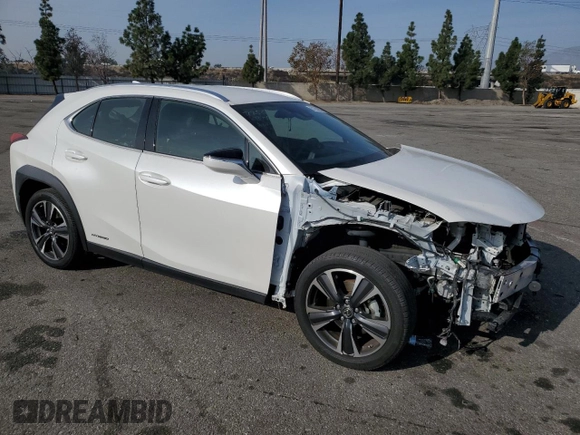 2022 Lexus UX 250h with VIN JTHX9JBH2N2056285, listed as a Copart auction lot 87221214 with 33,377 mi miles and Salvage title. Bid and sale history available at DreamBid. Image 4.