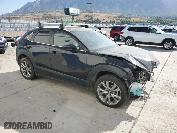 2023 Mazda CX-30 S Carbon Edition with VIN 3MVDMBCM6PM504431, listed as a Copart auction lot 61154795 with 90,396 mi miles and Salvage title. Bid and sale history available at DreamBid. Image 4.